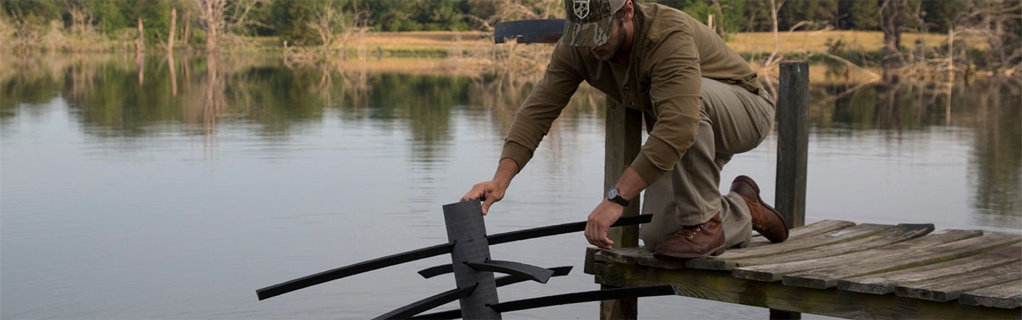 Placing a fish habitat in the water from a dock